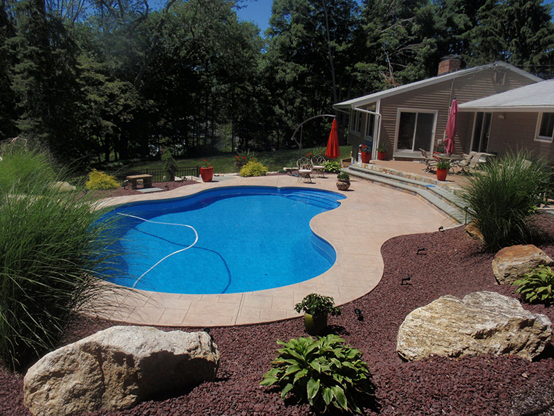 Swimming pool and stamped concrete project example 32